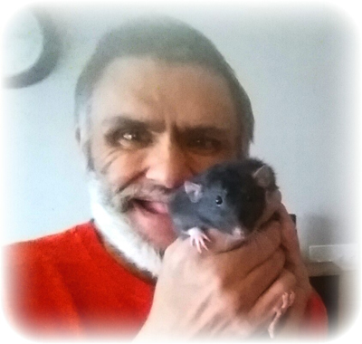 Greg with his pet rat, "Kitty"