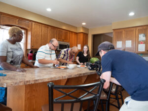 People preparing food in a kitchen