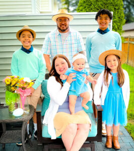 Family posing for professional photo.