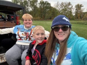 Greta Goins with two boys.