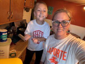 Greta Goins with a little boy.