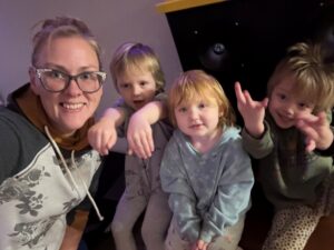 Greta Goins with three kids.