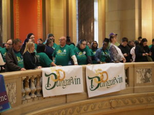 Dungarvin staff and persons served on balcony of MN State Capitol Building rotunda.
