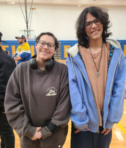 Luca and Wyatt standing together, smiling.