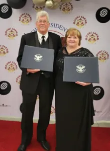 Maryann and David Bufford holding their Mount Carmel Lifetime Achievement Awards.