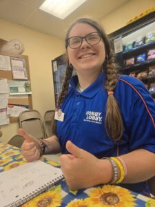 Angie working at Hobby Lobby.