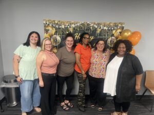 Barb Stanford in group shot with other Indiana office managers.