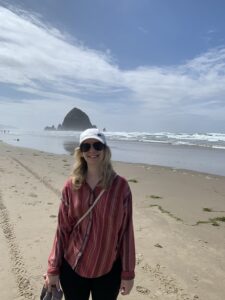 Sarah Cave on an ocean beach.