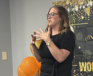 Meredith Freeman speaking about Barb during the party.