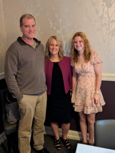 Sheri Butler with her husband and daughter.