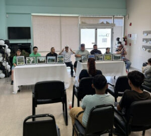 Class participants showing their work.